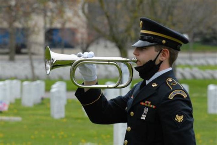 Who can play Taps at a funerals?